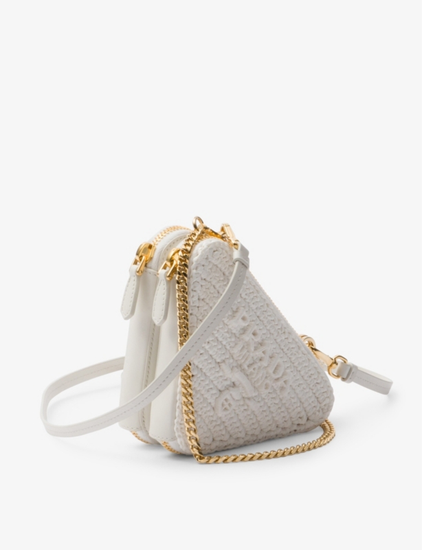 Triangle-shaped woven cross-body bag