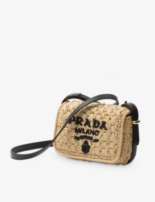 Shop Prada Brand-embroidered Woven Shoulder Bag In Neutral