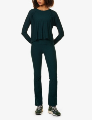 BEYOND YOGA WOMENS BEYOND YOGA SPACEDYE FLARED-LEG HIGH-RISE STRETCH-JERSEY TROUSERS 