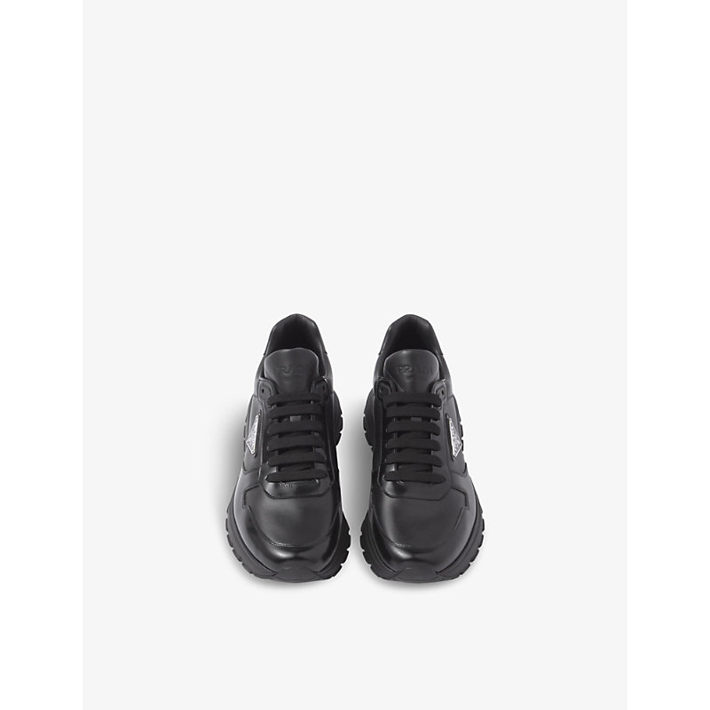 Shop Prada Brand-plaque Leather Low-top Trainers In Black