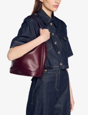 Sandro Logo-print Bucket Bag In Rouges