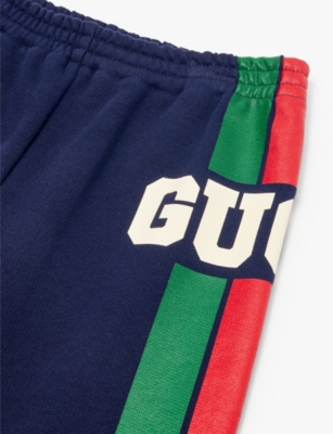 GUCCI DARK NIGHT SKY/MC BRAND-PRINT STRIPED COTTON-JERSEY JOGGING BOTTOMS 4-12 Y 