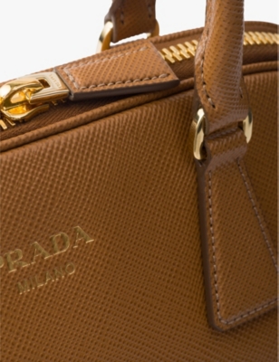 PRADA: Logo-embossed large saffiano leather tote bag