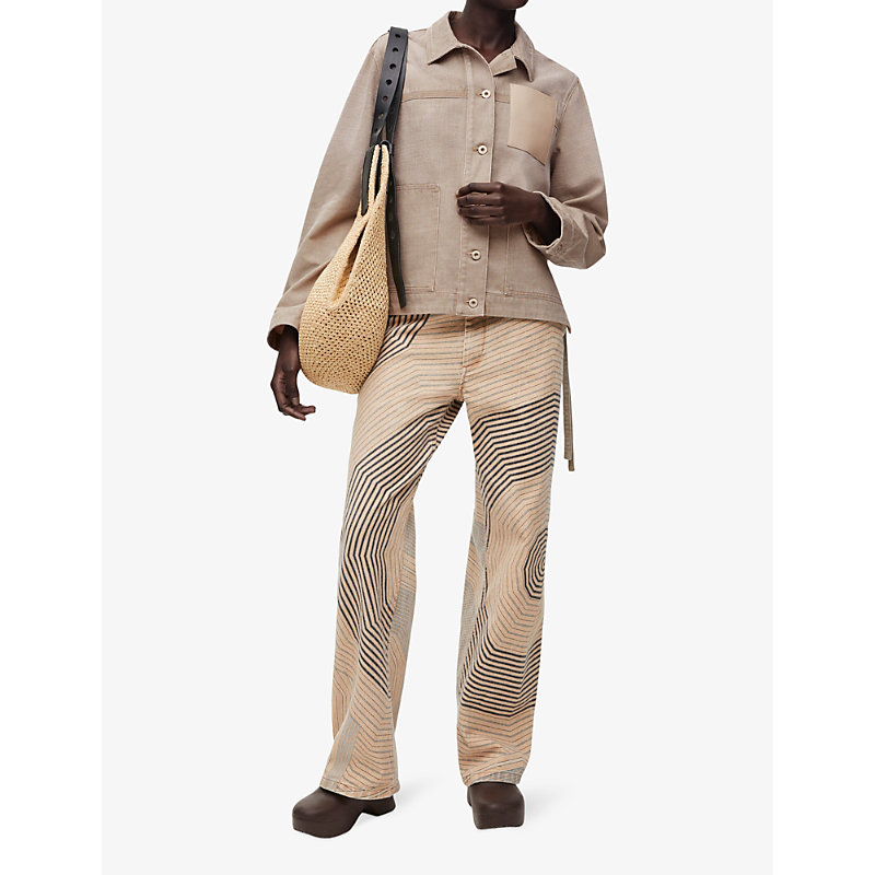 Shop Loewe X Paula's Ibiza Anagram-patch Asymmetric-front Relaxed-fit Denim Workwear Jacket In Beige
