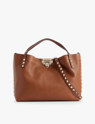 VALENTINO GARAVANI Rockstud detachable strap leather tote bag Selfridges