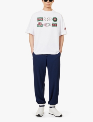 GUCCI: Brand-print striped-print straight-leg relaxed-fit woven-piqué jogging bottoms
