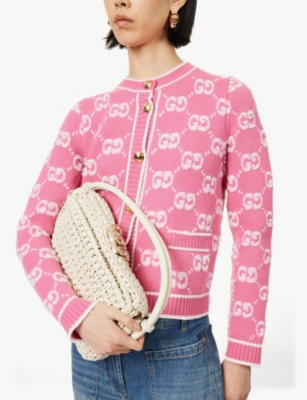 GUCCI: GG-logo basket-weave leather top-handle bag