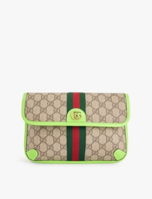 GUCCI Monogram print Web stripe coated canvas belt bag Selfridges