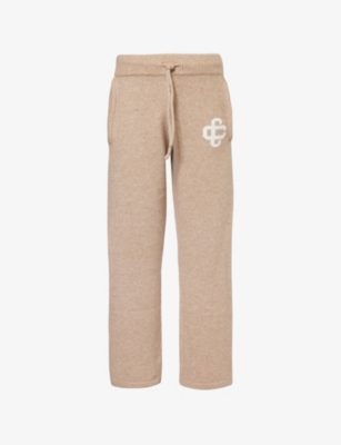 THE COUTURE CLUB: Logo-intarsia relaxed-fit knitted trousers