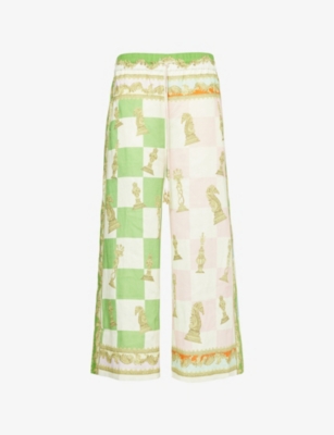 ALEMAIS: Checkmate graphic-print linen trousers