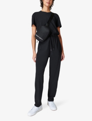 Shop Sweaty Betty Womens Explorer Tapered-leg Stretch-woven Jumpsuit Black