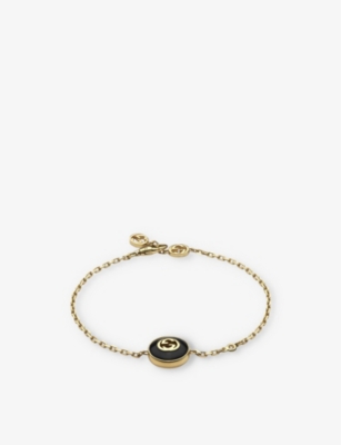 GUCCI: Two-toned 18ct yellow-gold, diamond and onyx bracelet