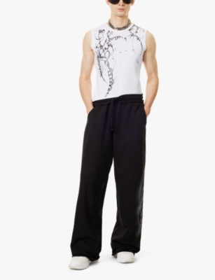 Shop Jaded London Mens  Tribal Star Graphic-print Straight-leg High-rise Cotton-jersey Jogging Bottoms In Black