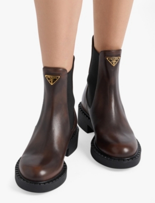 PRADA: Triangle-plaque leather chelsea boots