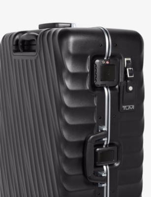 TUMI: Extended Trip expandable four-wheel shell checked suitcase 76cm