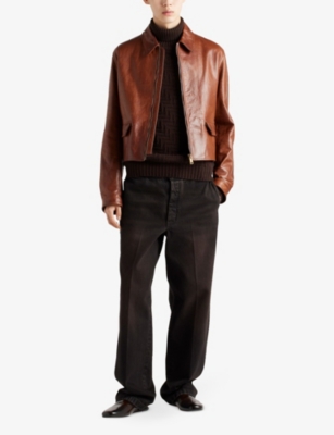 PRADA: Faded relaxed-fit wide-leg jeans
