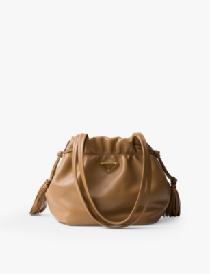 PRADA: Drawstring triangle-plaque nappa leather shoulder bag