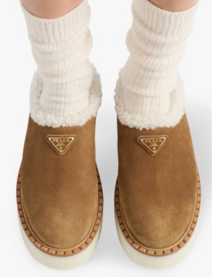 PRADA: Brand-plaque shearling-lined suede mules