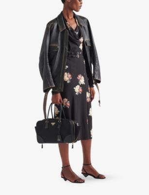 PRADA: Vintage-finish triangle-patch leather blouson jacket
