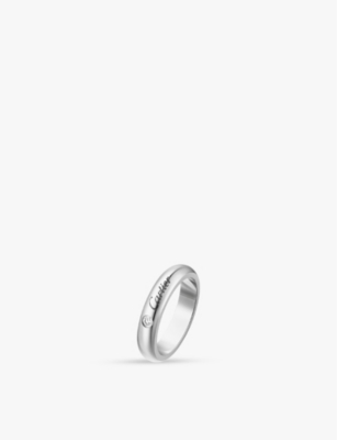 CARTIER: C de Cartier platinum and 0.03ct brilliant-cut diamond ring