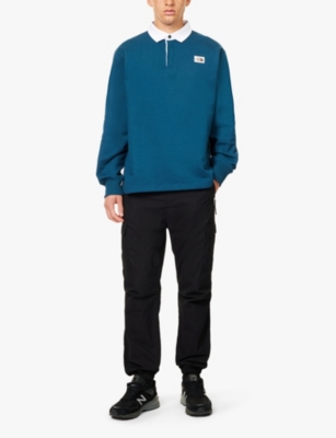 THE NORTH FACE MENS MIDNIGHT PETROL HERITAGE RUGBY BRAND-PRINT COTTON-JERSEY SWEATSHIRT 