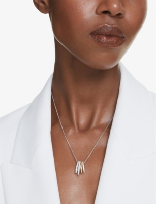 SWAROVSKI: Hyperbola yellow gold-tone and rhodium-plated zirconia pendant necklace