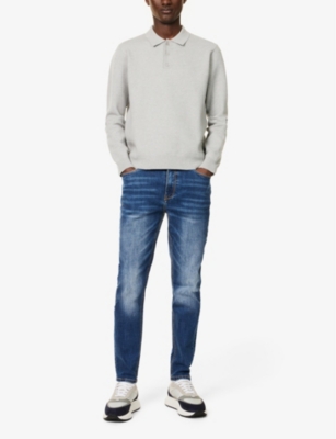 Five-pockets brand-patch tapered-leg slim-fit stretch-denim jeans