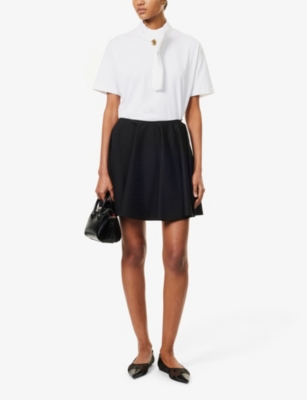 GIVENCHY: Pleated monogram wool mini skirt