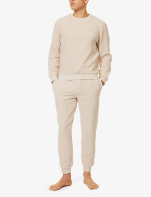 HUGO BOSS MENS BOSS LOGO-EMBROIDERY RELAXED-FIT RECYCLED-POLYESTER BLEND STRETCH-BORG JOGGING BOTTOMS 