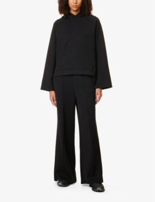 We Are Tala Omens Black Softsmart Flared-sleeve Oversized Jersey Hoody In Black