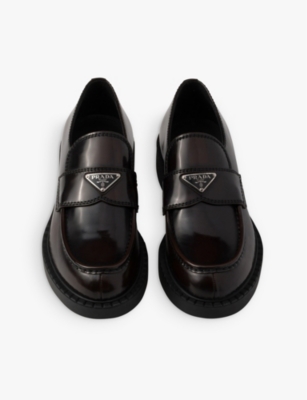 PRADA: Chocolate logo-plaque brushed leather loafers