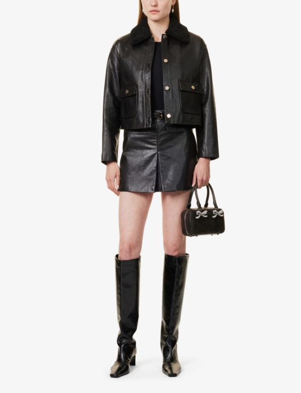 Mid-rise welt-pocket leather mini skirt