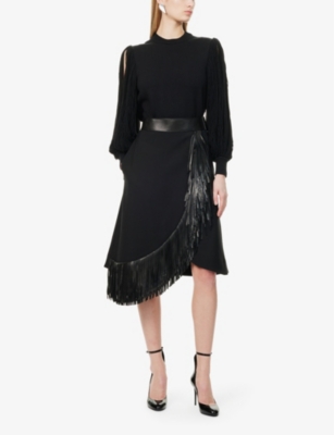 ALAÏA WOMENS NOIR ALAIA LEATHER-FRINGES FLARED STRETCH-WOOL MIDI SKIRT 