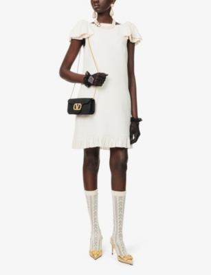 VALENTINO GARAVANI: Couture bow-applique wool-silk blend crepe mini dress