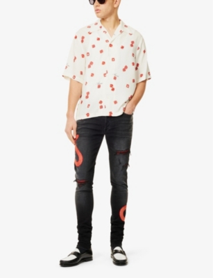 AMIRI: Faded-wash skinny-leg slim-fit stretch-denim jeans