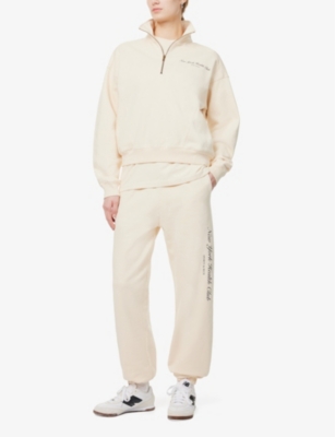 SPORTY & RICH: NY Health Club Text-Print Cotton-Jersey Jogging Bottoms