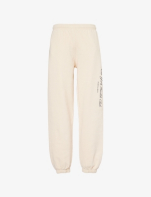 SPORTY & RICH: NY Health Club Text-Print Cotton-Jersey Jogging Bottoms