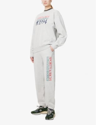 SPORTY & RICH: Finish Line Text-Print Cotton-Jersey Jogging Bottoms
