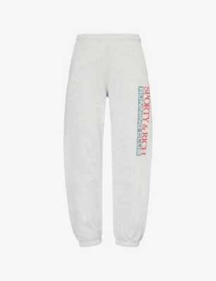 SPORTY & RICH: Finish Line Text-Print Cotton-Jersey Jogging Bottoms