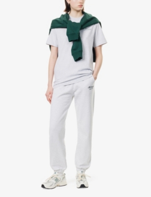 SPORTY & RICH: The Carlyle Script Relaxed Cotton-Jersey Jogging Bottoms
