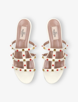Valentino Rockstud Caged Leather Flat Sandals In White/comb