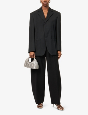 JACQUEMUS: The Ovalo Curved Wide-Leg Woven Trousers