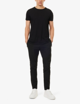 ARNE: Active Technical zip-pockets tapered-leg slim-fit stretch-woven trousers