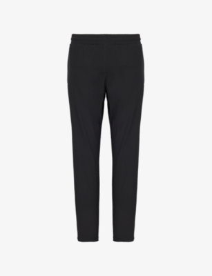 ARNE: Active Technical zip-pockets tapered-leg slim-fit stretch-woven trousers