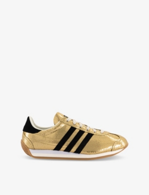 Adidas gold stripe trainers online