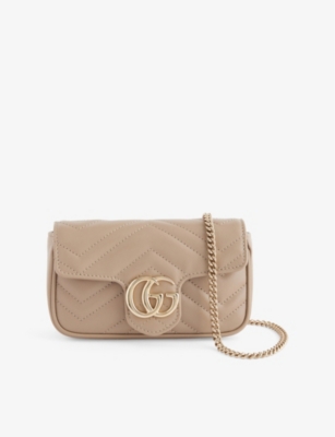 GUCCI: Logo-hardware quilted leather mini shoulder bag