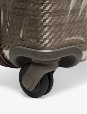 TUMI: International Expandable 4-Wheeled Polycarbonate Carry-on Suitcase 55cm