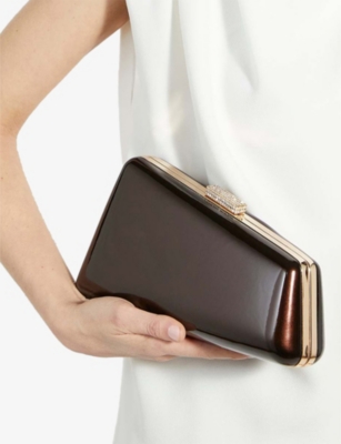 DUNE WOMENS BROWN PATENT BALANCING ASYMMETRIC PATENT FAUX-LEATHER CLUTCH BAG 