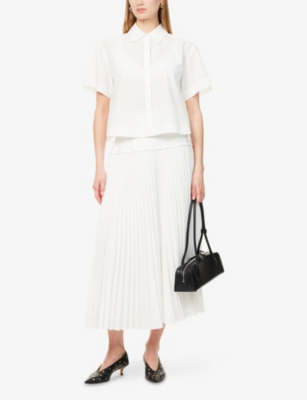SIMKHAI: Stella Pleated Woven Midi Skirt