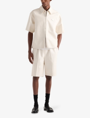 Prada Mens Neutral Triangle-logo Relaxed Leather Bermuda Shorts In Neutral